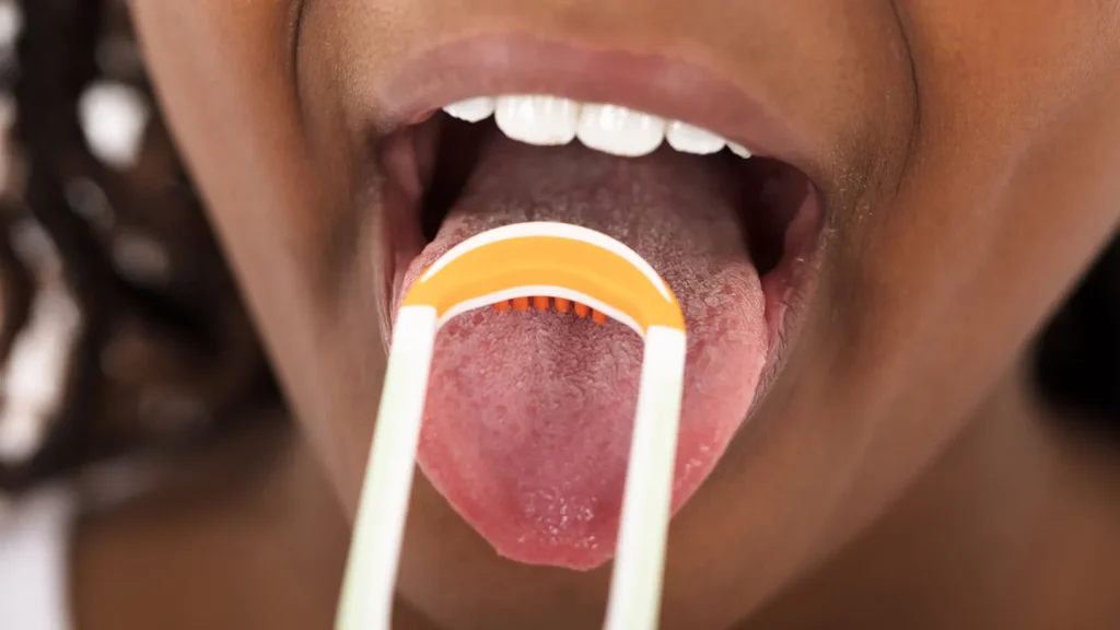 10 Remarkable Benefits of Tongue Scraping in Ayurveda